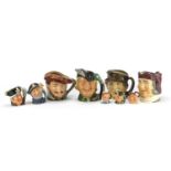 Nine Royal Doulton Toby jugs including Robin Hood and Long John Silver, the largest 16.5cm :For