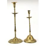 Ottoman Empire brass candlesticks with turned columns, the largest 55.5cm high :For Further