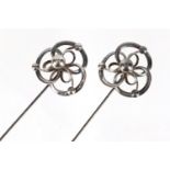 Pair of Art Nouveau silver hat pins by Charles Horner, Chester 1913, each 22cm in length :For