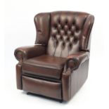 Brown leather wingback reclining armchair with button back, 99cm high :For Further Condition Reports