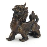 Chinese patinated bronze Foo dog, 11.5cm in length :For Further Condition Reports Please visit Our