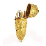 18th century Rococo gilt metal repoussé etui decorated with nude maidens within C scrolls, the