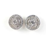 Pair of 10ct white gold diamond halo earings, 1.1cm in diameter, 2.8g :For Further Condition Reports