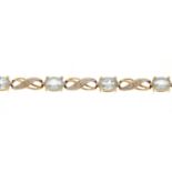 9ct gold blue stone and diamond bracelet, 20cm in length, 6.2g :For Further Condition Reports Please