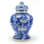 Large Chinese blue and white porcelain baluster vase and cover, hand painted with prunus flowers,