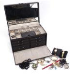 Costume jewellery including pairs of 9ct gold earrings, wristwatches and silver rings, housed in a