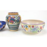 Four hand painted Poole Pottery bowls and vases, one by Ann Hatchard and a Carlton Ware floral