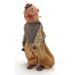 19th century hand painted clockwork clown, 26.5cm high :For Further Condition Reports Please visit