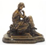 Patinated bronze study of a seated female seated in classical dress, on shaped base, 29cm high :