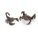 Japanese patinated bronze scorpion and crab, one with impressed marks to the underside, the