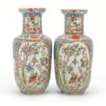 Pair of Chinese Canton porcelain vases, hand painted in the famille rose palette with figures, birds