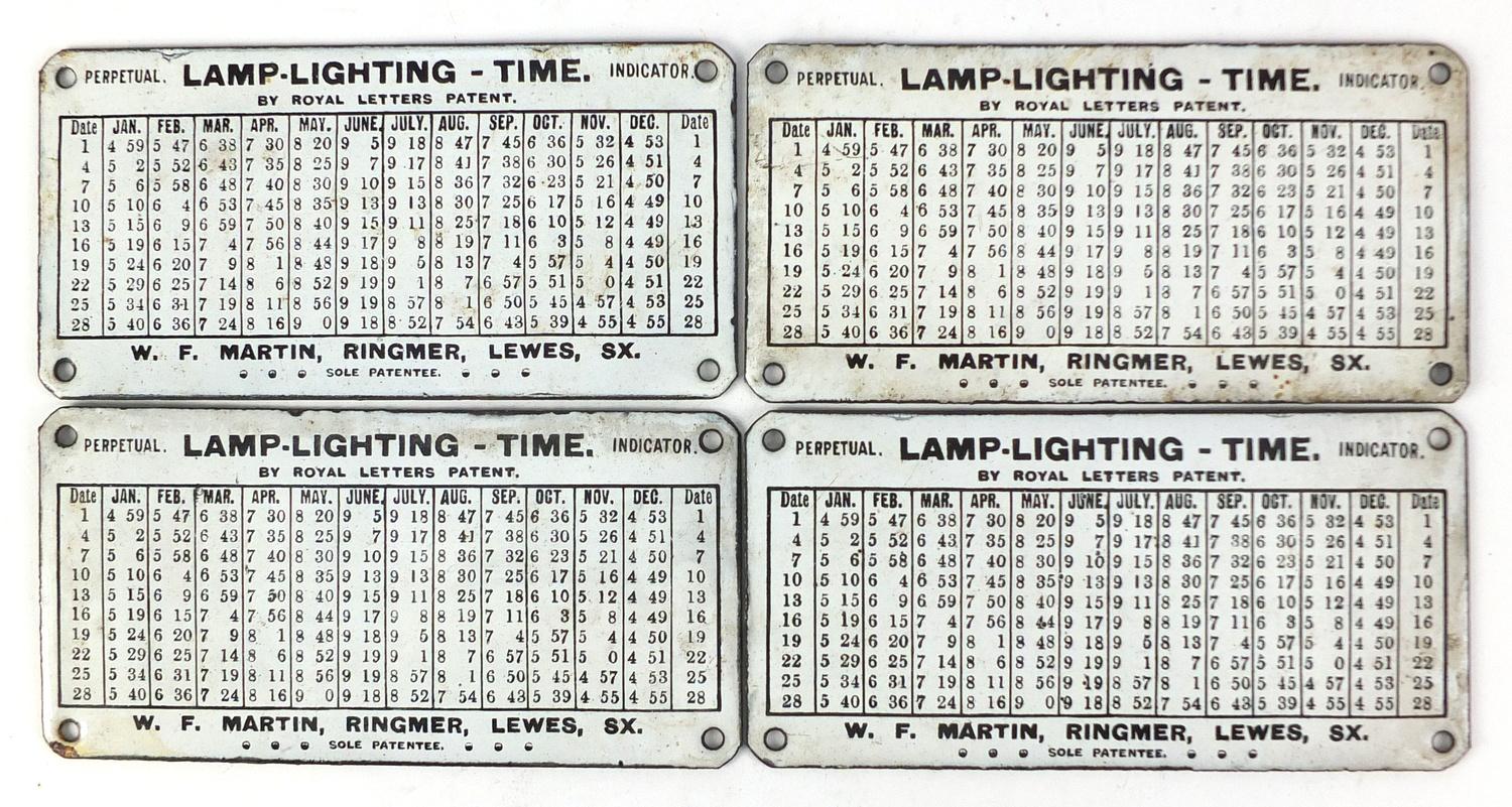 Set of four vintage lighting lamp time perpetual indicator enamel advertising plaques by Royal