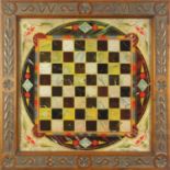 19th Century glass chess board by T Morrison, housed in a carved oak frame dated 1893, overall 66.