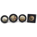 Four Victorian Prattware pot lids housed in ebonised frames, including Sebastopol, On Guard and