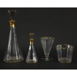 French cut glass glassware by Baccarat including two decanters, one with paper label, the largest