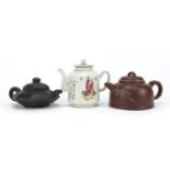 Three Chinese teapots including two Yixing terracotta examples, the largest 12.5cm high :For Further