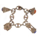 Middle eastern 800 grade silver charm bracelet set with colourful cabachon stones, 57.0g :For