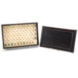 Mahjong type deck of cards housed in a hardwood case, case 25.5cm wide :For Further Condition
