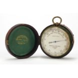 Large brass cased pocket compensated barometer by Negretti & Zambra of London with velvet and silk