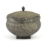 Indian unmarked silver box and cover, profusely embossed with foliage, 8cm high, 151.8g :For Further