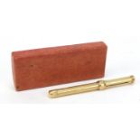 S Mordan & Co unmarked gold propelling pencil with engine turned body, 8cm in length when closed,