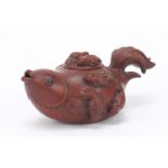 Chinese Yixing terracotta teapot in the form of a fish, impressed character marks to the base, 17.