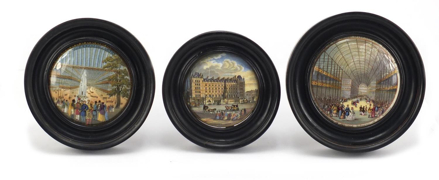 Three Victorian Prattware pot lids housed in ebonised frames comprising Crystal Palace, Interior