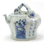 Chinese archaic style blue and white porcelain teapot, hand painted with flowers and calligraphy,