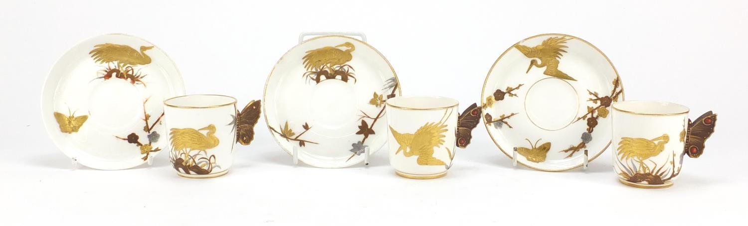 Three aesthetic Worcester coffee cans and saucers with butterfly design handles, each gilded with - Image 4 of 6