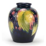 Moorcroft pottery vase, hand painted in the leaf and berry pattern, painted and impressed marks to