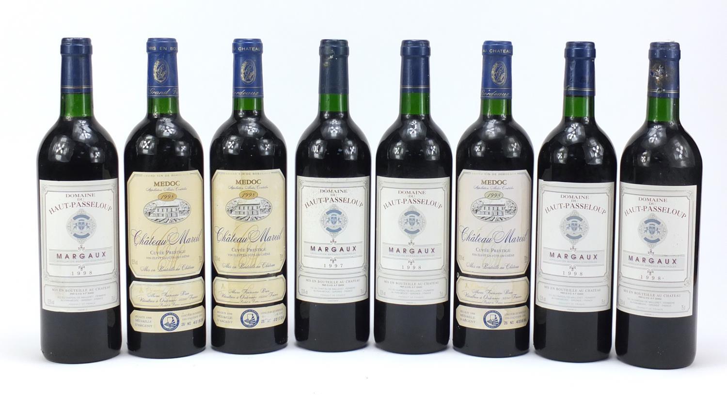 Eight bottles of red wine comprising five bottles of 1998 Haut-Passeloup Margaux and three bottles