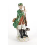 19th century Meissen porcelain figure of a huntress with a dog, blue cross sword marks to the