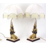 Pair of gilt bronze Thai buddha design table lamps with shades, overall 80cm high :For Further