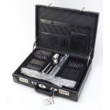 As new Swiss 72 piece canteen of cutlery housed in a leather brief case :For Further Condition