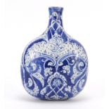 Turkish Iznik pottery water flask, hand painted with stylised flowers and foliage, 20cm high :For