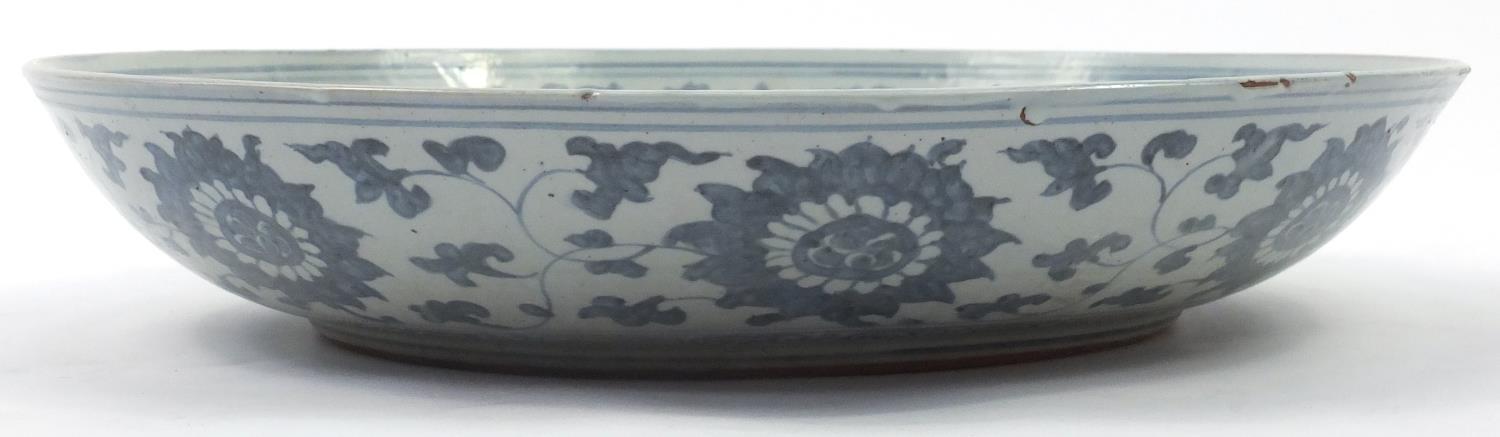 Large Chinese blue and white porcelain charger, hand painted with stylised flower heads amongst - Image 3 of 4