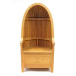 Pine porters chairs in the form of boat hull with draw to the base, 147cm high :For Further