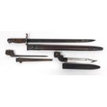 Three military interest bayonets including a US military Remington 1913 pattern bayonet with