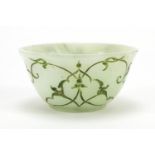 Islamic pale green jade cup incised with stylised foliage, 6cm in diameter :For Further Condition