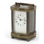Serpentine brass cased carriage clock with enamel dial with Roman numerals, 12cm high :For Further