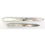 Two Victorian silver and mother of pearl folding fruit knives, hallmarked Sheffield 1847 and 1863 :