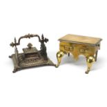 Victorian brass inkstand and a miniature Georgian brass footman, the largest 17cm wide :For