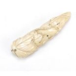 Japanese ivory handle carved with a rat amongst leaves, 12.5cm in length :For Further Condition
