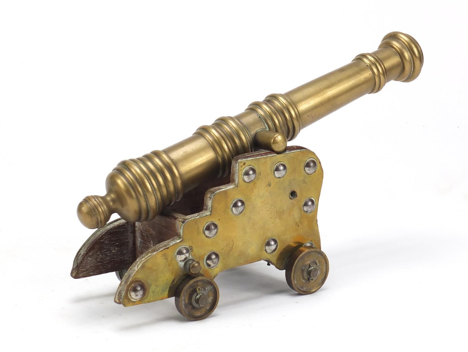 Antique brass table cannon and carriage, 24.5cm in length :For Further Condition Reports Please - Image 3 of 6