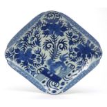 Chinese blue and white porcelain platter hand painted with a qilin amongst flowers, sixfigure