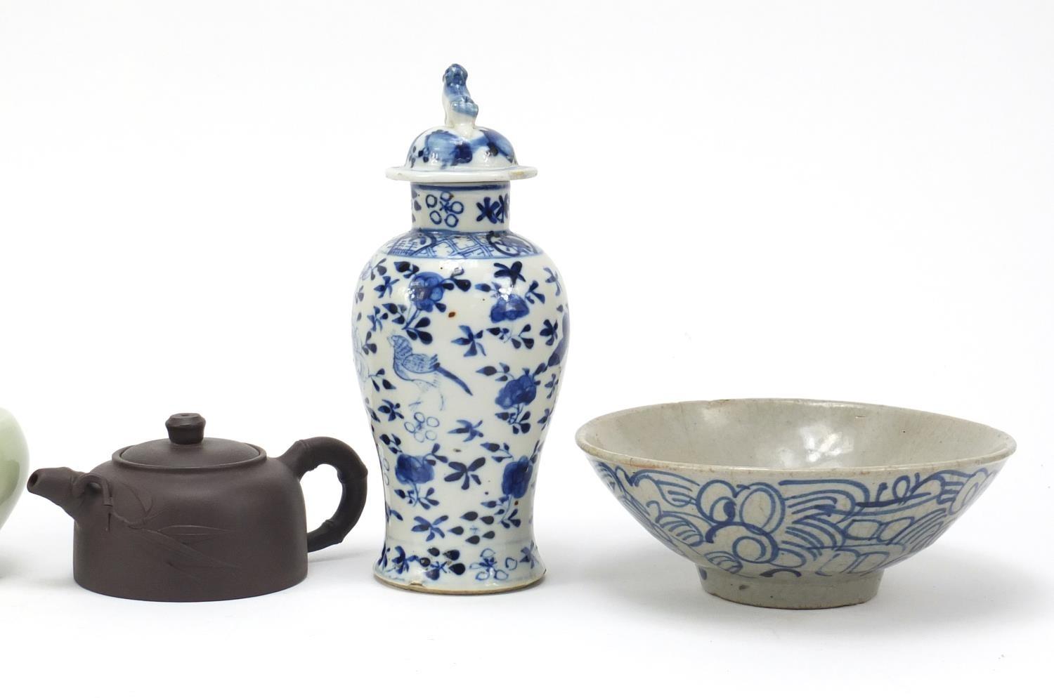 Chinese ceramics including a Celadon glazed vase, Yixing teapot, and blue and white baluster vase - Image 3 of 7