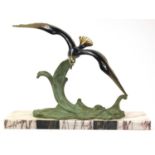 French Art Deco marble and bronzed sculpture of a swooping bird in flight, signed CH Rohol, 50cm