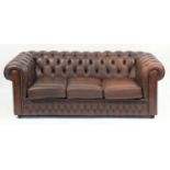 Brown leather three seater Chesterfield settee with buton back, 186cm wide :For Further Condition