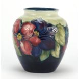 Moorcroft pottery vase, hand painted with flowers, painted and impressed marks to the base, 13cm