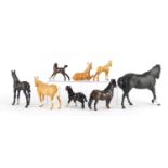Eight Beswick horses and foals including Shetland pony and matt black example, the largest 18cm high